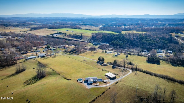 aerial view featuring a mountain view and a rural view