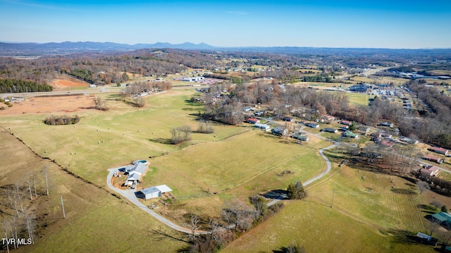 bird's eye view with a mountain view and a rural view