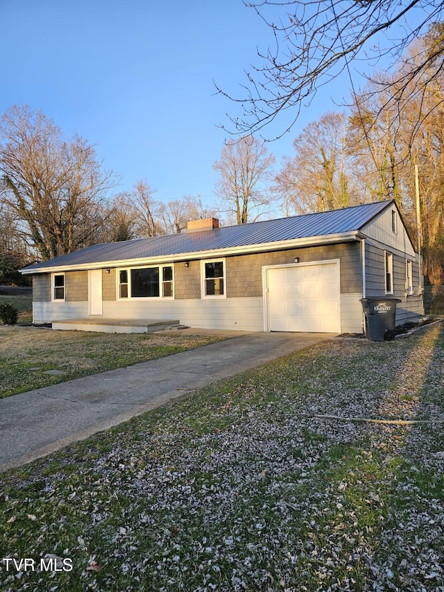 ranch-style home with a garage