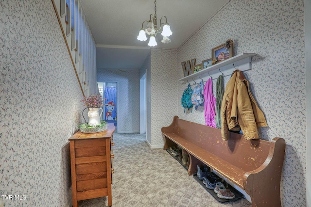 mudroom with carpet, lofted ceiling, crown molding, and a notable chandelier