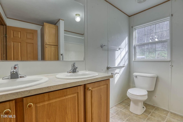 bathroom with vanity and toilet