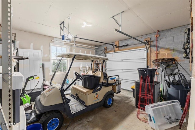 garage featuring a garage door opener