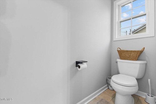 bathroom featuring tile patterned floors and toilet