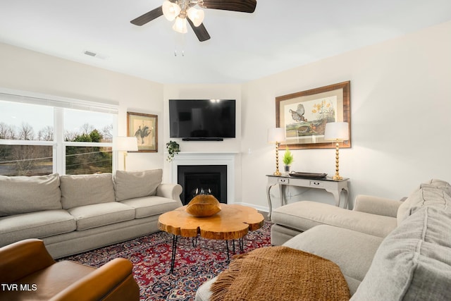 living room featuring ceiling fan