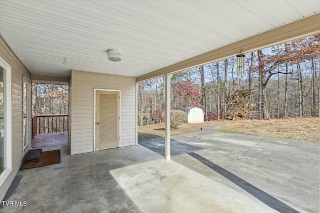 view of patio / terrace with a storage shed