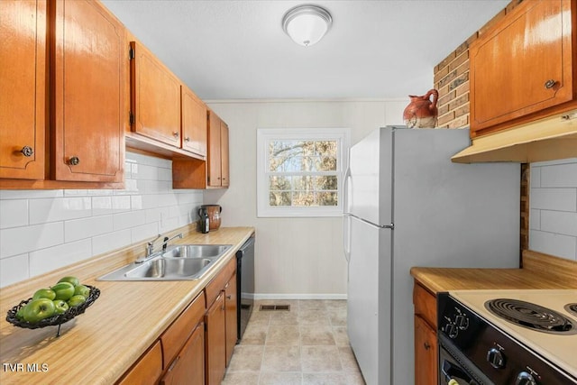 kitchen featuring sink, black dishwasher, backsplash, white range with electric cooktop, and light tile patterned flooring