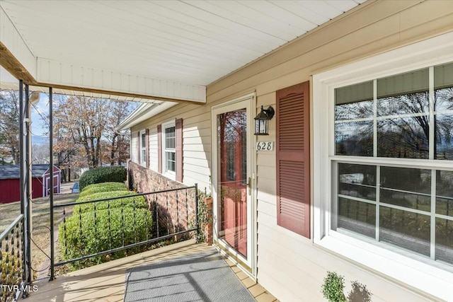 doorway to property with a porch