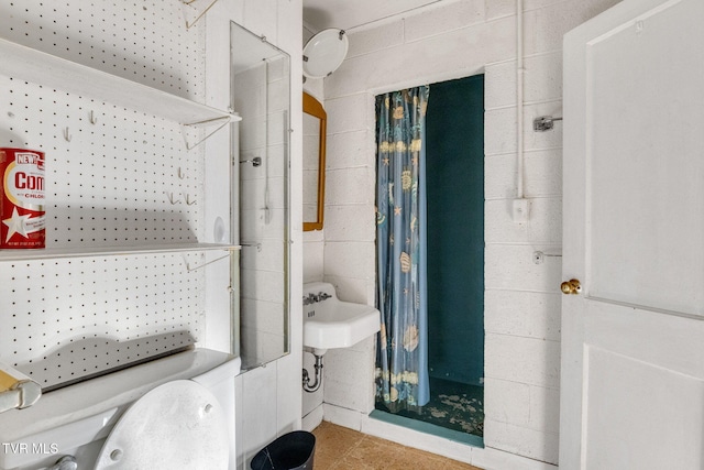 bathroom featuring tile patterned floors and sink