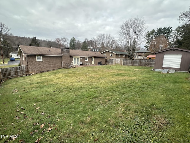 view of yard with a storage shed