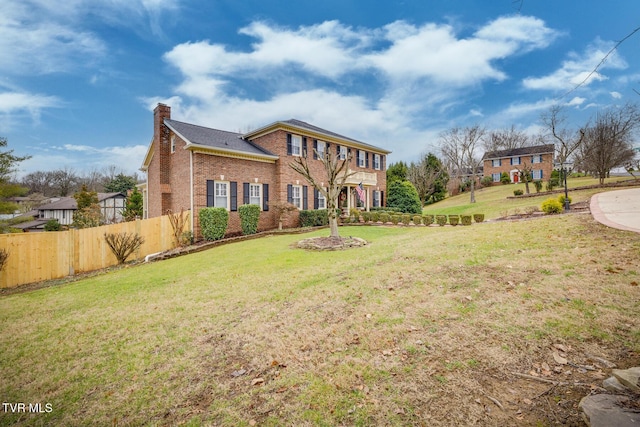 view of front facade with a front lawn