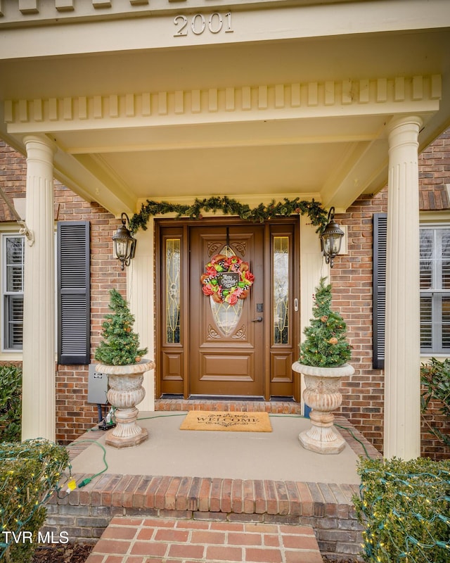 entrance to property with covered porch