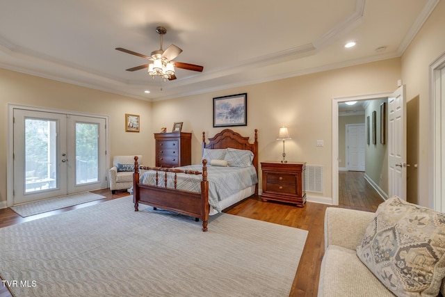 bedroom featuring ceiling fan, french doors, light hardwood / wood-style flooring, access to outside, and ornamental molding