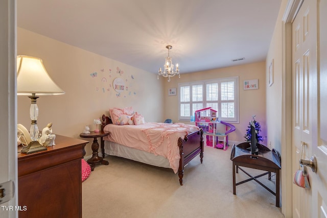 bedroom with light carpet, a chandelier, and a closet