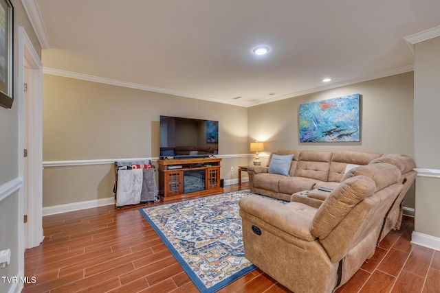 living room with hardwood / wood-style floors and crown molding