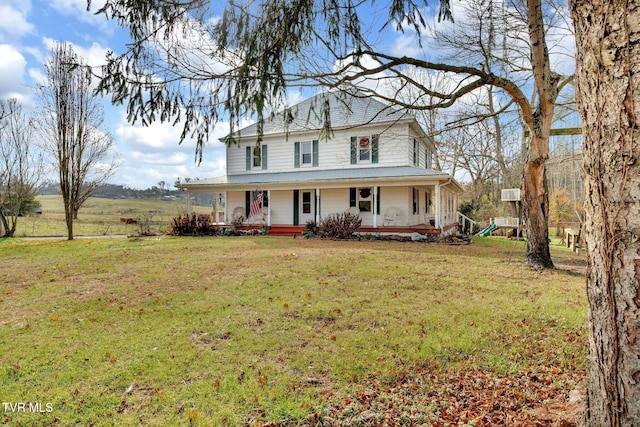 farmhouse-style home featuring a front yard and a porch