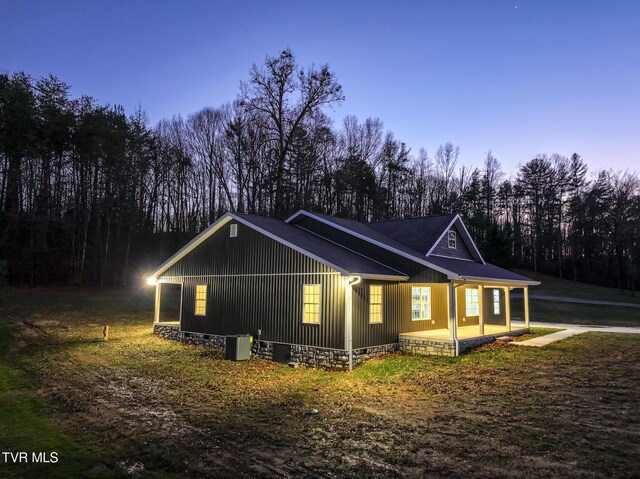 property exterior at dusk with central AC