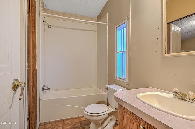 full bathroom with vanity, shower / tub combination, toilet, parquet flooring, and a textured ceiling