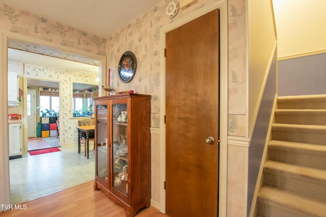 hall with light wood-type flooring