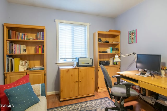 home office featuring light hardwood / wood-style flooring