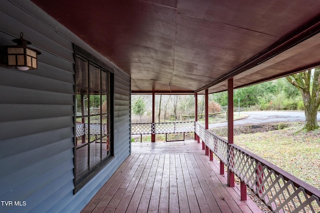 wooden deck featuring covered porch