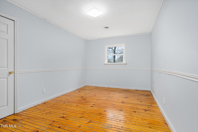 unfurnished room featuring light hardwood / wood-style floors