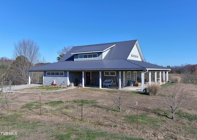 farmhouse inspired home featuring a patio