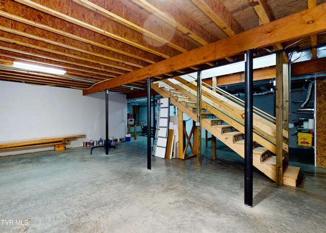 unfinished basement with stairway