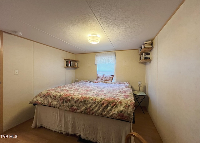 bedroom featuring a textured ceiling