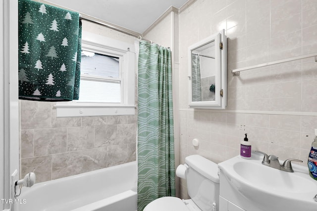 full bathroom featuring vanity, shower / bath combination with curtain, tile walls, and toilet