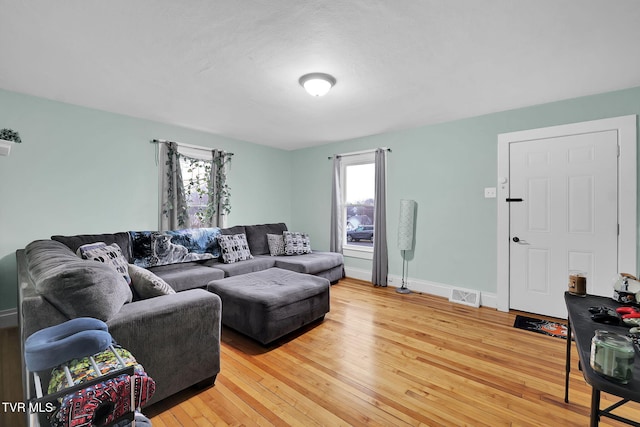 living room with hardwood / wood-style flooring