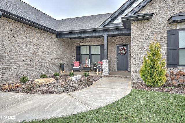 entrance to property with covered porch