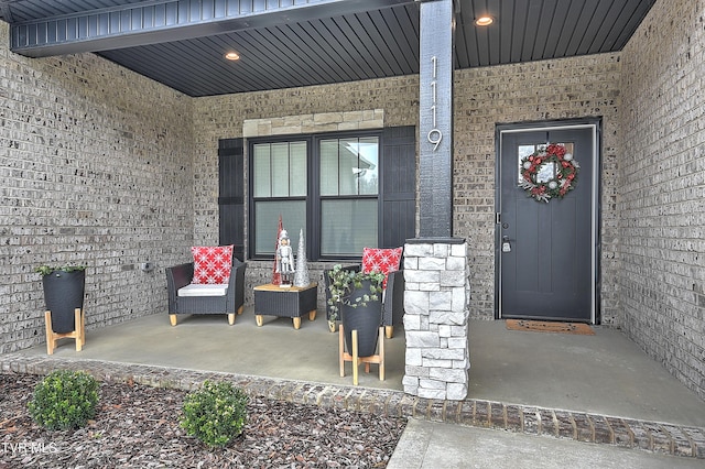 property entrance featuring covered porch