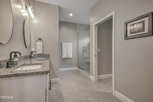 bathroom featuring vanity and walk in shower