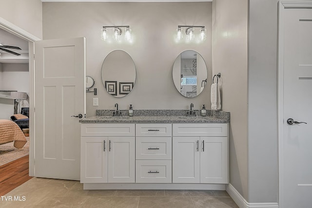 bathroom featuring vanity and wood-type flooring