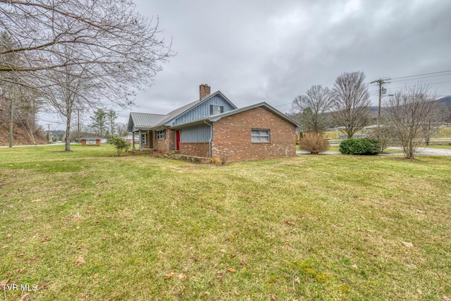 view of property exterior with a lawn