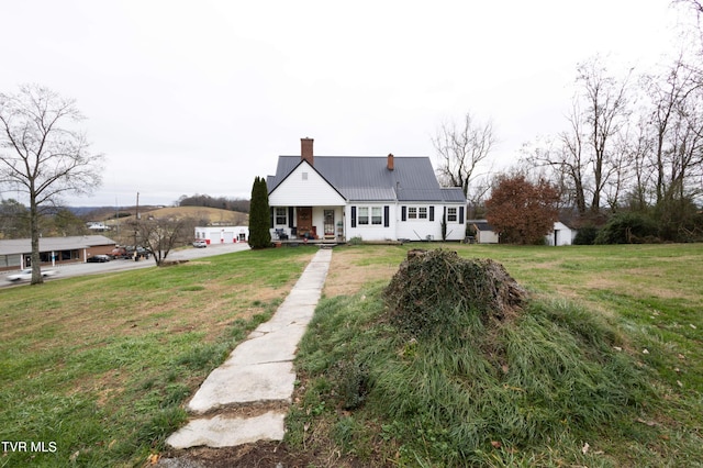 view of front of property with a front lawn and a porch