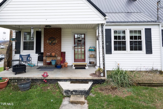 doorway to property featuring a porch