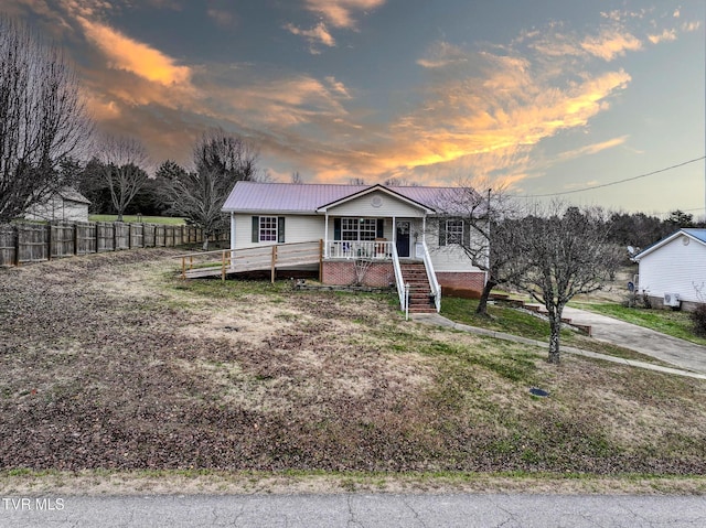 view of front of property featuring a porch