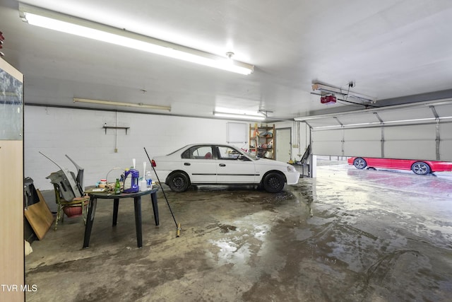 garage featuring a garage door opener