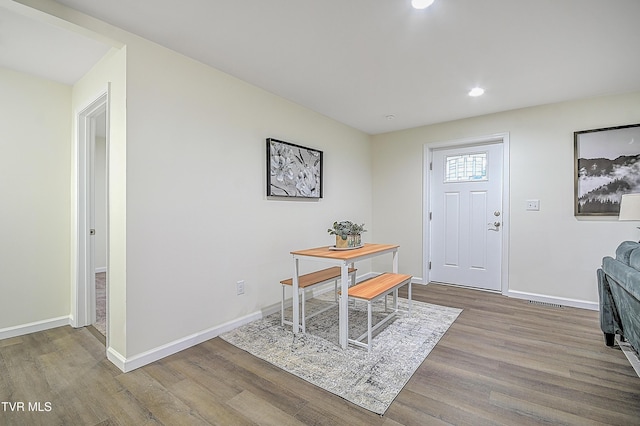 dining space featuring hardwood / wood-style flooring