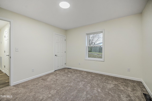 view of carpeted spare room