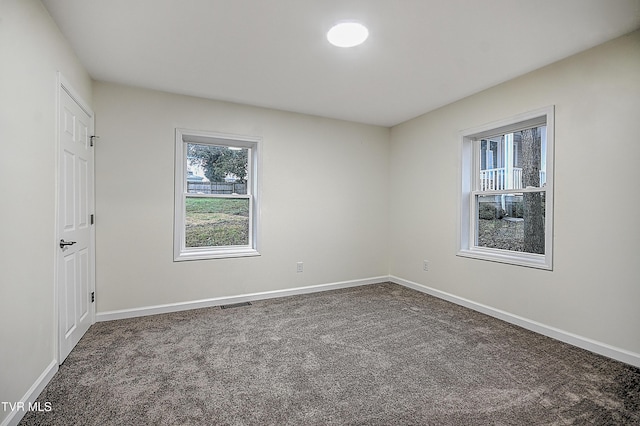 view of carpeted spare room