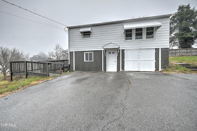 view of front property with a wooden deck