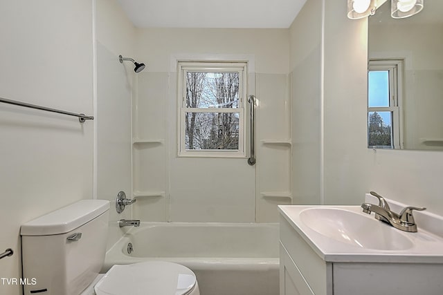 full bathroom featuring vanity, shower / bath combination, toilet, and a healthy amount of sunlight