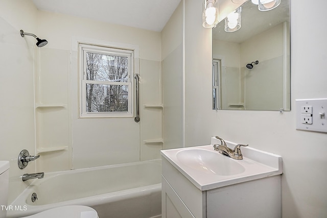 full bathroom featuring shower / washtub combination, vanity, and toilet