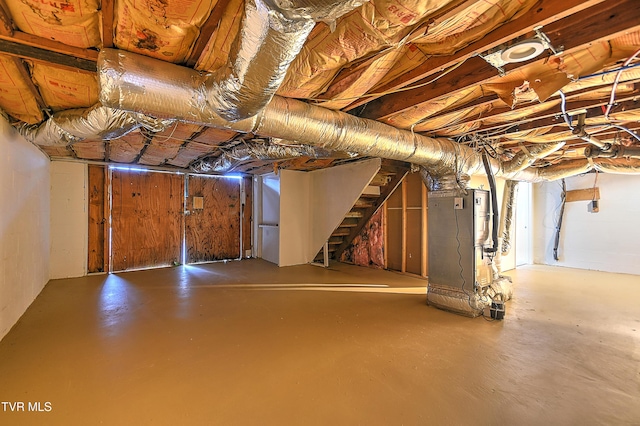 basement featuring heating unit