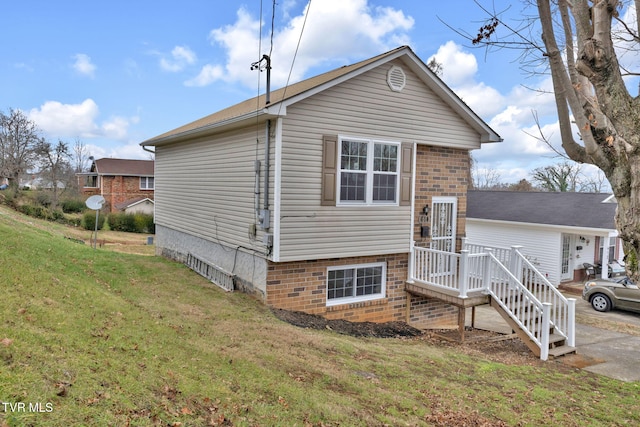 exterior space featuring a front lawn