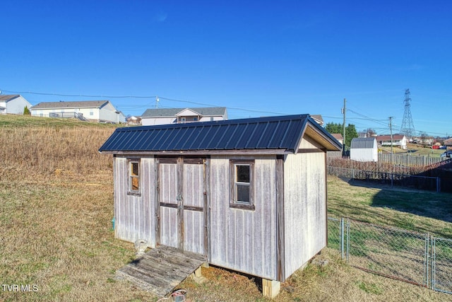 view of outdoor structure featuring a yard