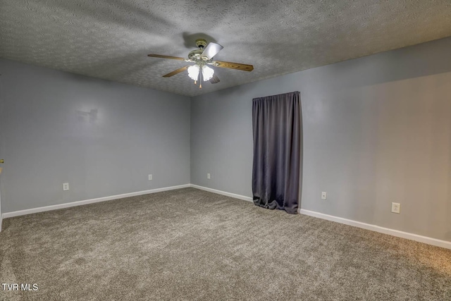 carpeted spare room with ceiling fan and a textured ceiling