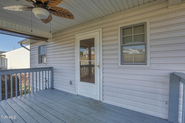 wooden deck with ceiling fan